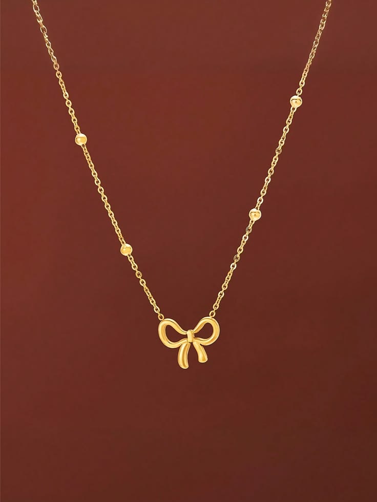 Gold Bow Necklece