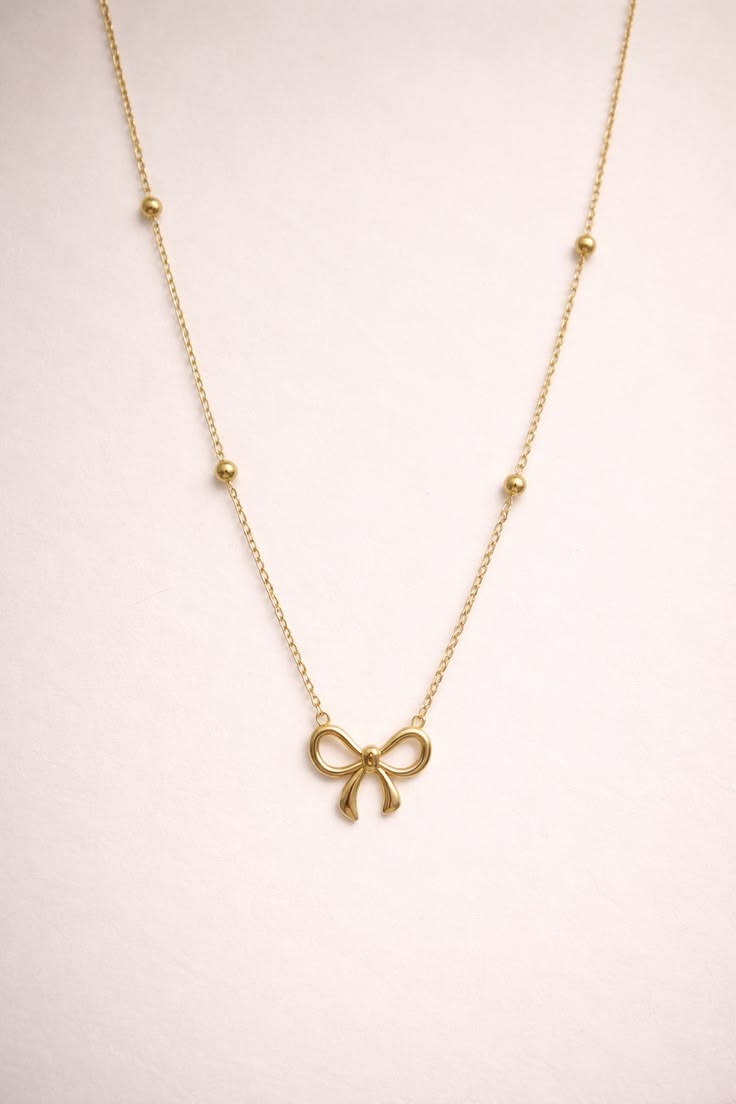 Gold Bow Necklece